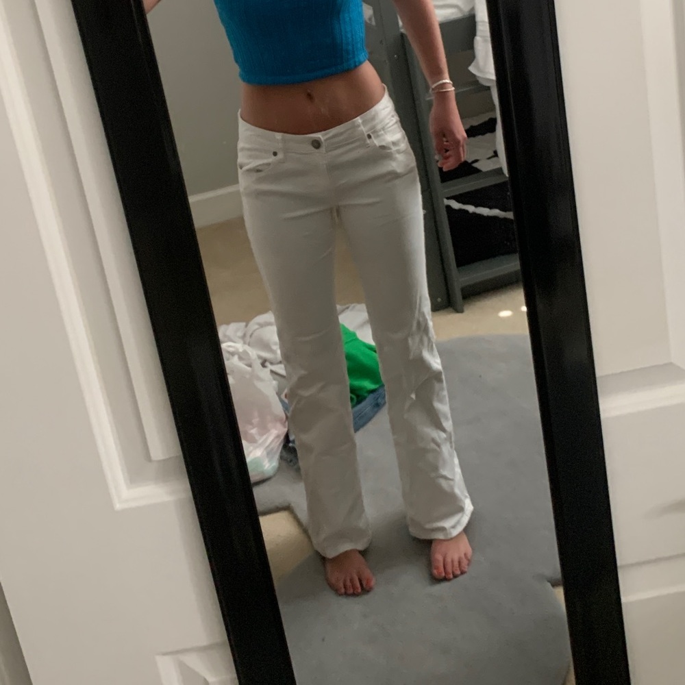 White flare low rise jeans
